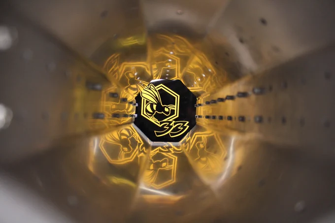 Image of Killer Bee logo from inside a fabricated sheet metal column