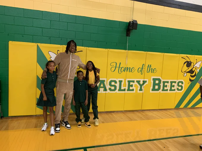 Ayo with Beasley Students in the gym where he played when attending Beasley