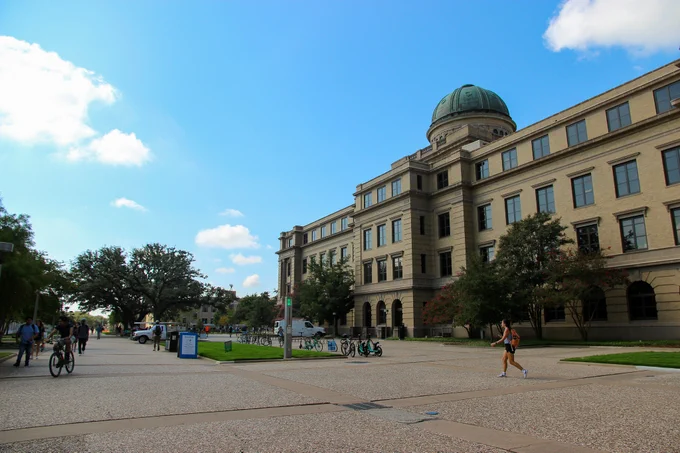 Students walking in Academic Plaza near the Academic Building.
