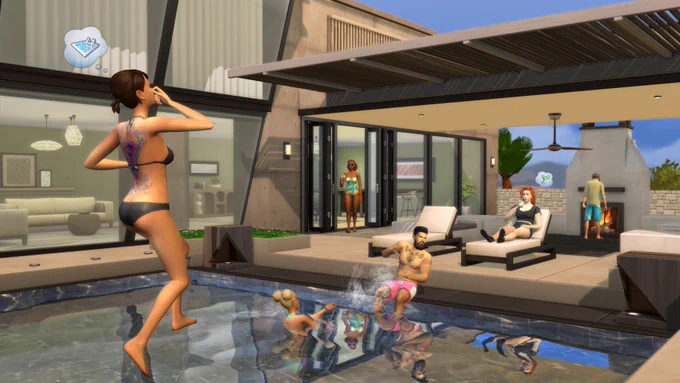 A static image of an outdoor pool in the backyard of a modern house. On the left is a female Sim with a large back tattoo wearing a black swimsuit jumping in the pool. There are two more Sims in the pool, with one splashing the other. In the back is a Sim sitting on a lounge chair and another Sim behind her tending to the fireplace.
