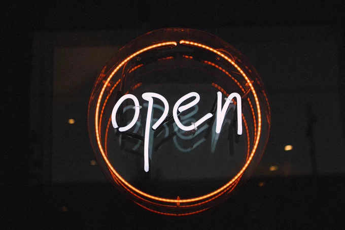 neon light of word Open in a circle