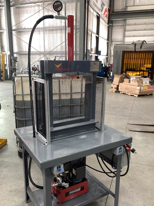 This is not your ordinary shop press!
Phoenix recently delivered this 10T H-Frame shop press to a customer in the Northeast US. 

So, what’s unique about this press? To start with, it’s not ordered out of a catalog. It is designed and built in the USA with an extra-rugged, fully-welded frame. Additionally, each build can be customized for width, daylight, and ram stroke. We can also accessorize these presses with electrical controls and safety components. For all of our H-Frame shop presses, Phoenix proudly partners with PowerX as a pump and cylinder supplier.