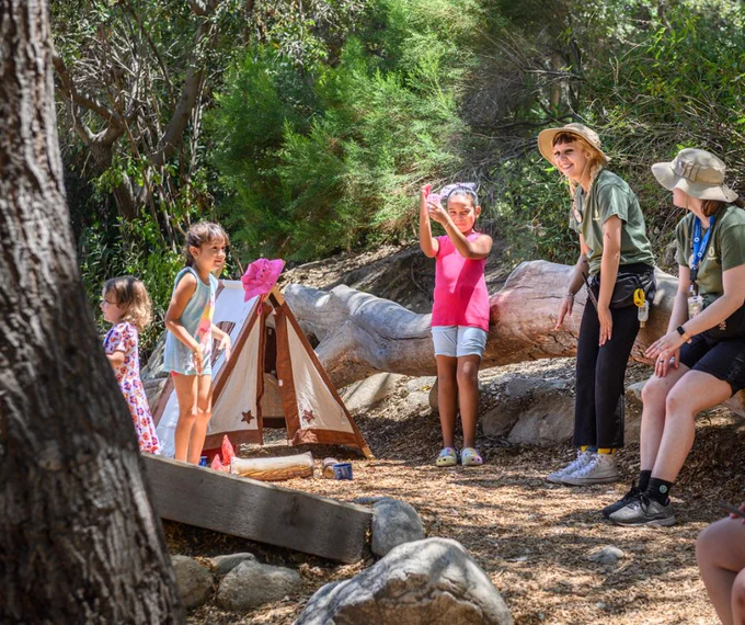 Children and guides at campsite