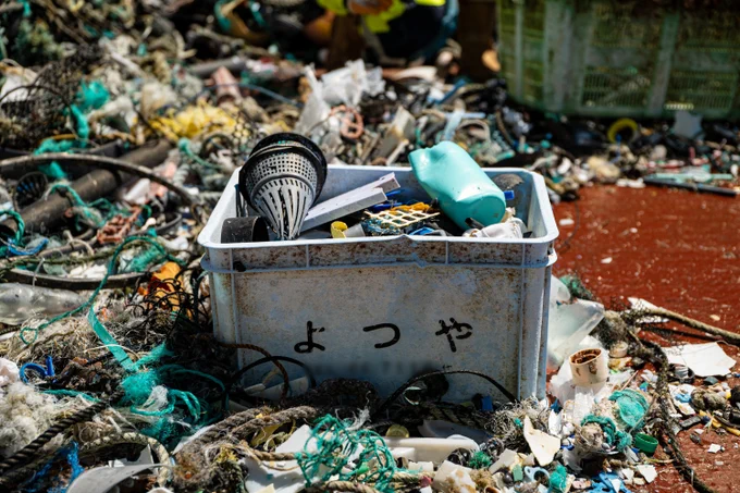 Catch from System 002 from the Great Pacific Garbage Patch, including eel trap (black cone), fishing nets, crate, ropes. 