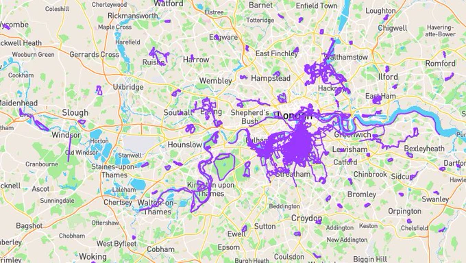 a very similar map of London and the surrounding area but with a much larger number of streets coloured purple, including a noticeable contiguous mass in the centre