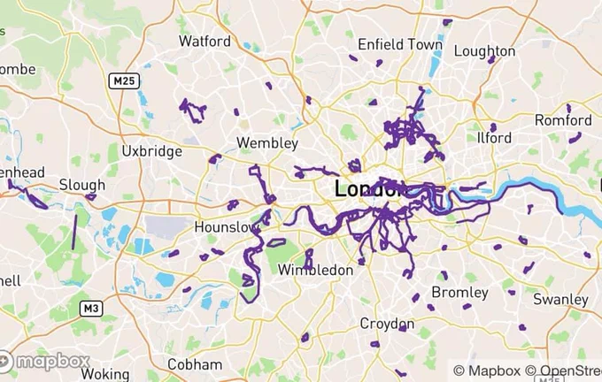 a map of London and the surrounding area in which some streets are marked in dark purple