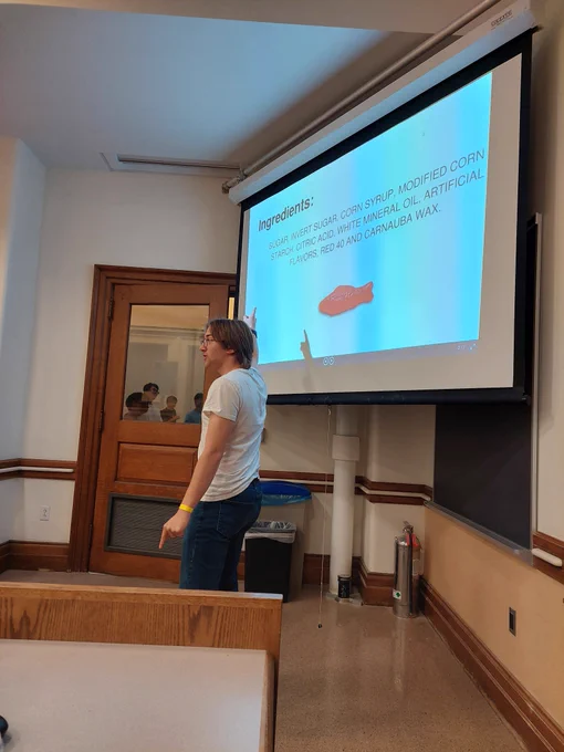 Person presenting a slideshow on Swedish Fish