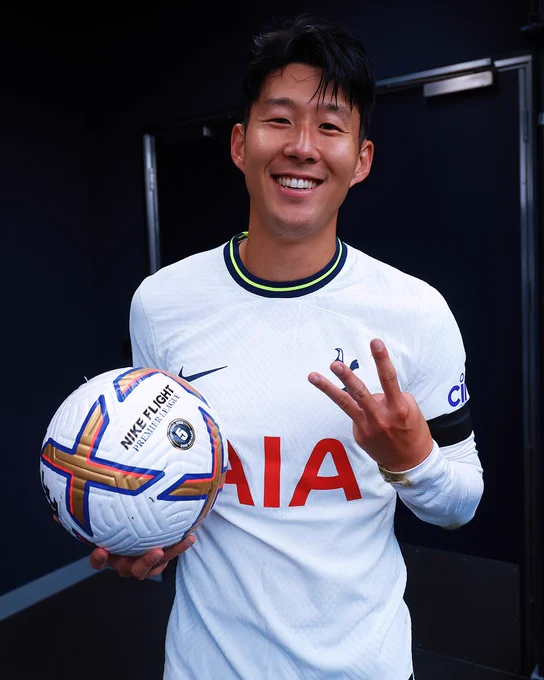 Heung-Min Son poses with his hat-trick match ball