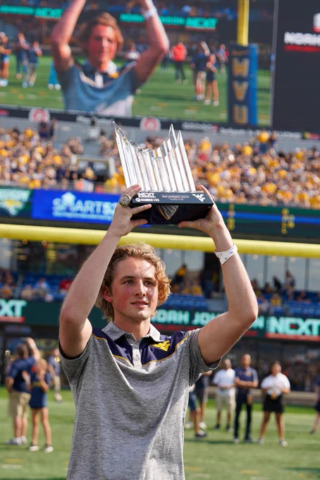 Noah Johnson was recognized for winning the Madden national championship during WVU’s football game against Towson.