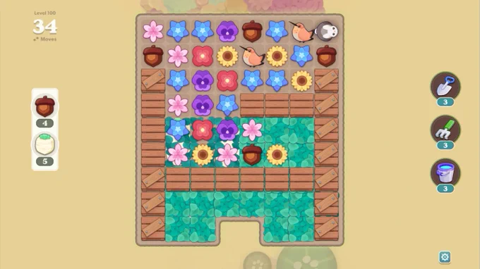 A screenshot of Garden Tails: Match and Grow showing a level where the bottom half is mostly covered up by obstacles. 