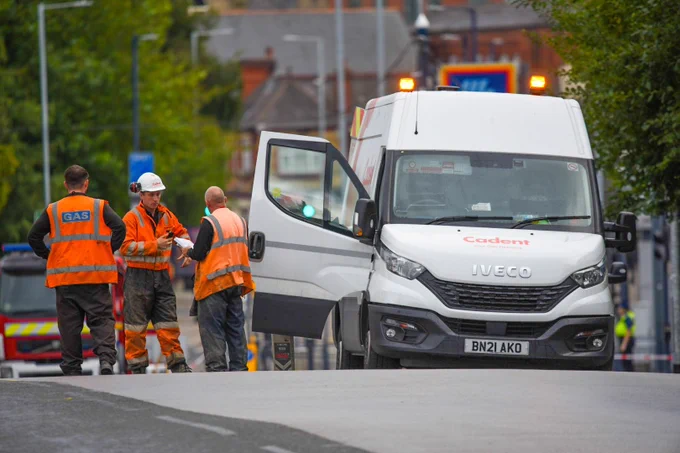 3 gas engineers and and a gas van at the incident