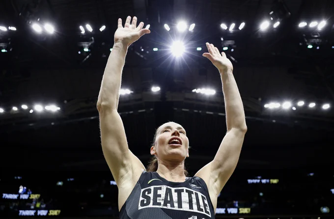 Sue Bird saluting the crowd at Climate Pledge Arena