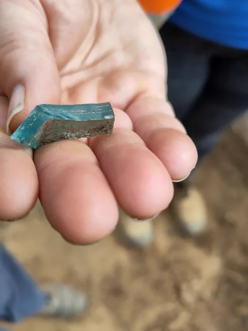 Small fragment of blue tinted Roman glass