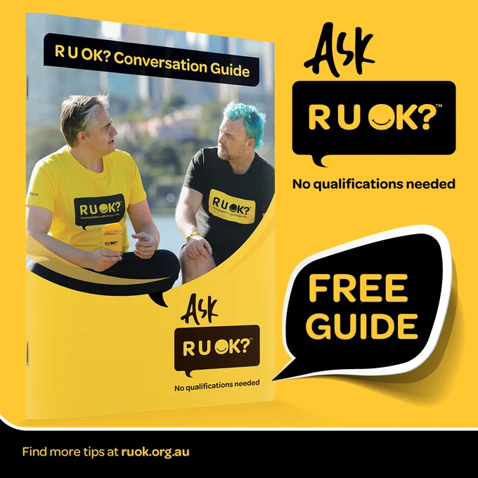 The front cover of the R U OK? conversation guide shows two men talking. Text reads: Ask R U OK? No qualifications needed