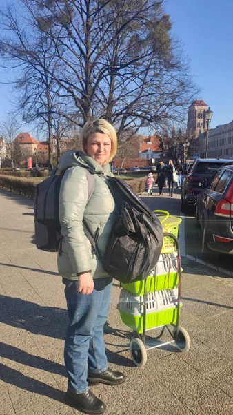Ira in Poland holding a small amount of possessions she was able to take with her as she searched for sanctuary. 