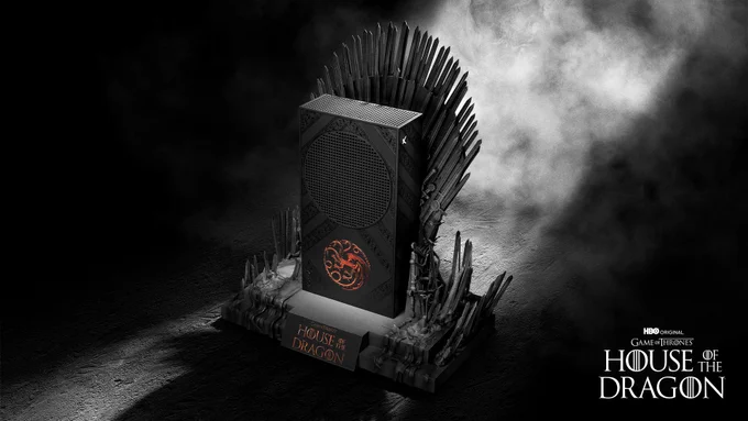 A black House of the Dragon themed Xbox Series S with red logos sits on a miniature throne replica, all of which are backlit by a ray of smoky white light. In the right corner are logos that read "HBO Original", "Game of Thrones", and "House of the Dragon."