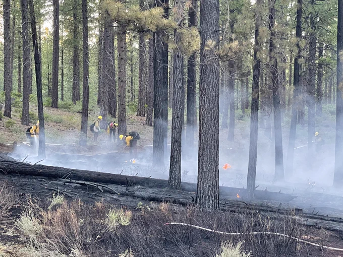 Crews put out a roadside fire in Central Oregon after a vehicle ignited the area. This photo taken earlier in fire season this year.