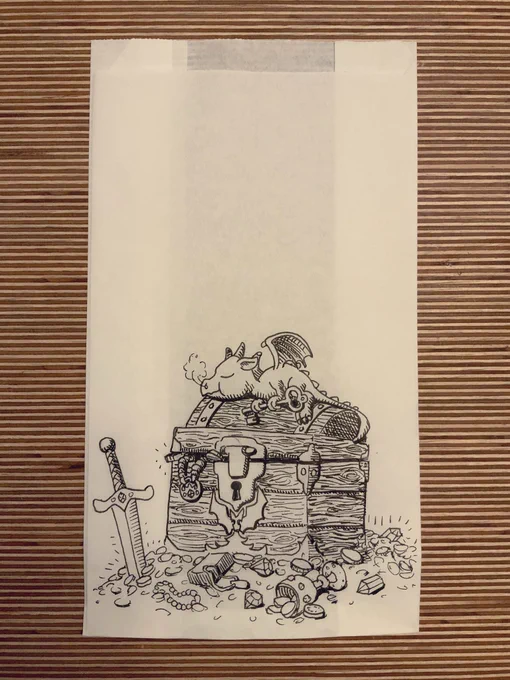 Drawing of a tiny Dragon on a chest