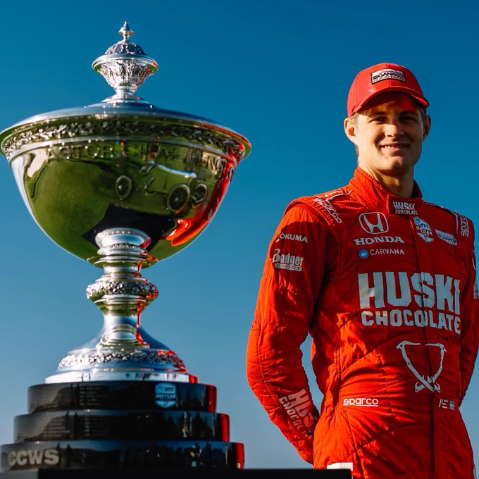 Marcus Ericsson next to the INDYCAR championship trophy, the Astor Challenge Cup.

IMAGE CREDIT: INDYCAR