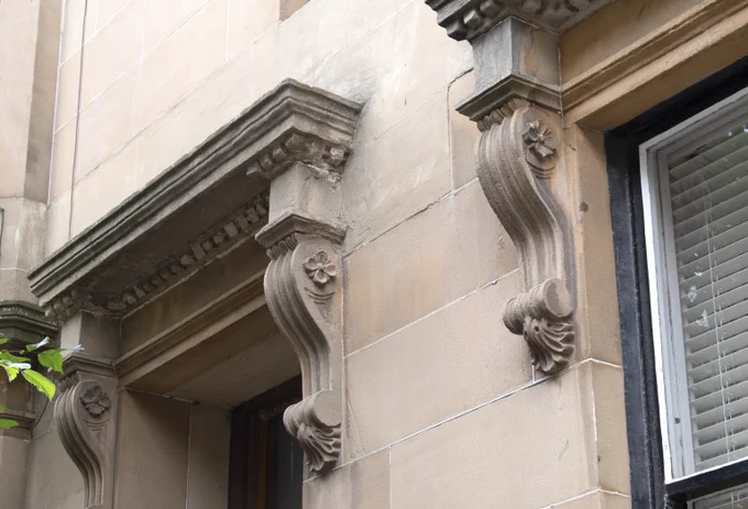 A sandstone tenement wall