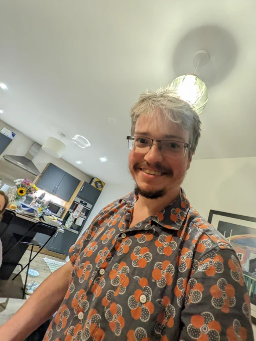 Me holding urllib3 stickers