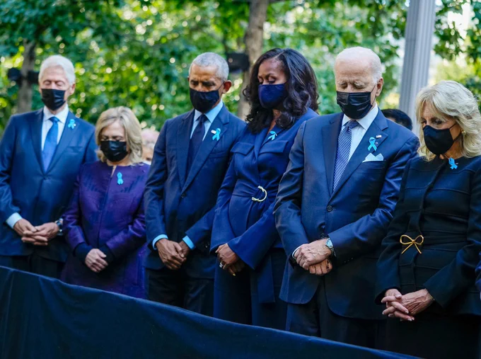 Former President Clinton, Former Secretary of State Hillary Clinton, Former President Obama, Former First Lady Michelle Obama, and President Biden and First Lady Dr. Jill Biden stand for a moment of silence at the 20th anniversary 9/11 Commemoration Ceremony at the National 9/11 Memorial and Museum on September 11, 2021 in New York.