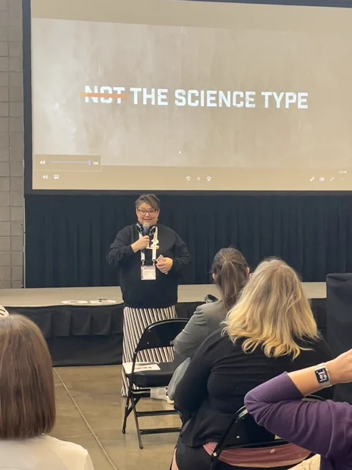 Women presenting a slide