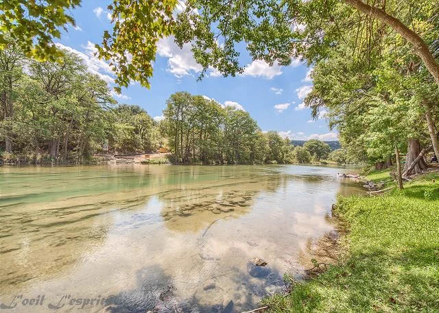 Concrete pad at the waters edge with ample seating, propane grill, paddle boat and direct river access. Tube rental company right across the street.