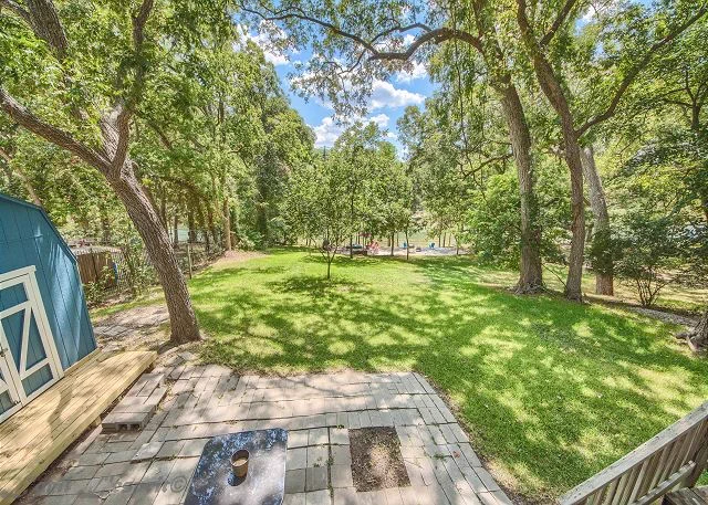 The huge backyard brings lots of room for the entire family & friends to enjoy hot summer days while being in the shade of beautiful Pecan trees!