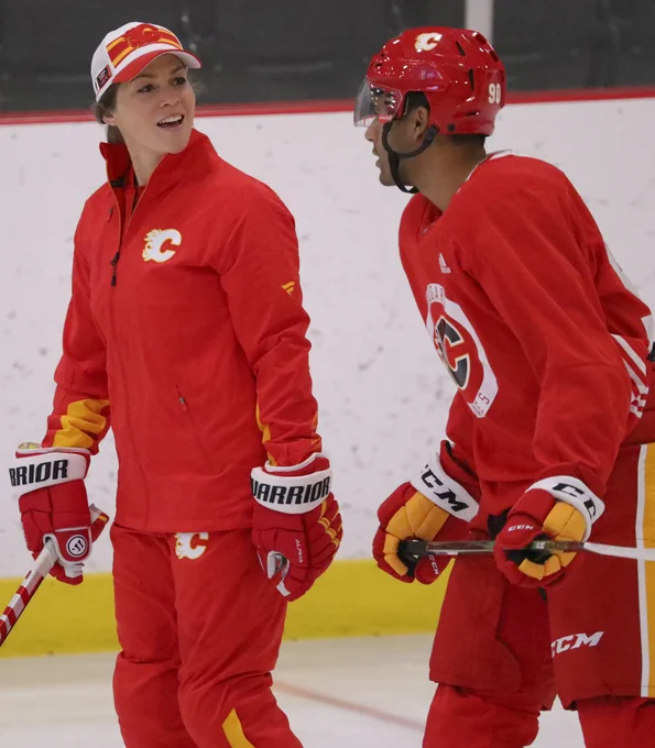 Rebecca Johnston on the ice as a guest coach during development camp