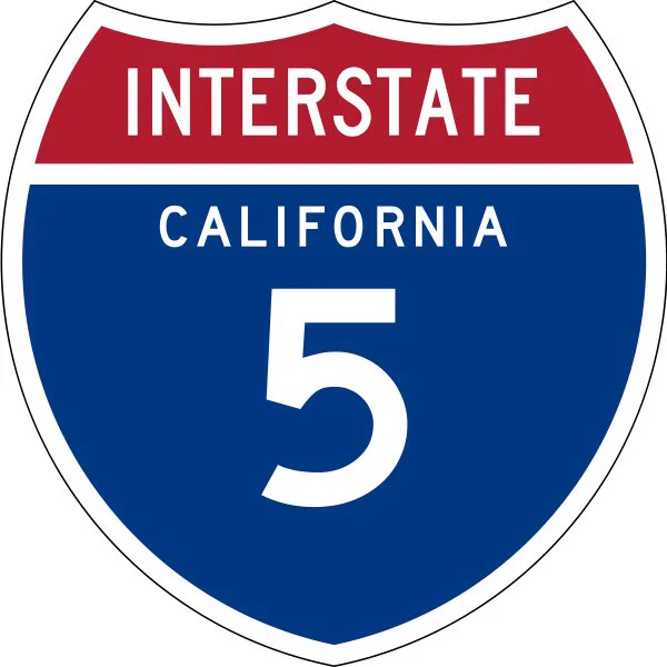 The highway emblem for Interstate 5 in red, white and blue colors.
