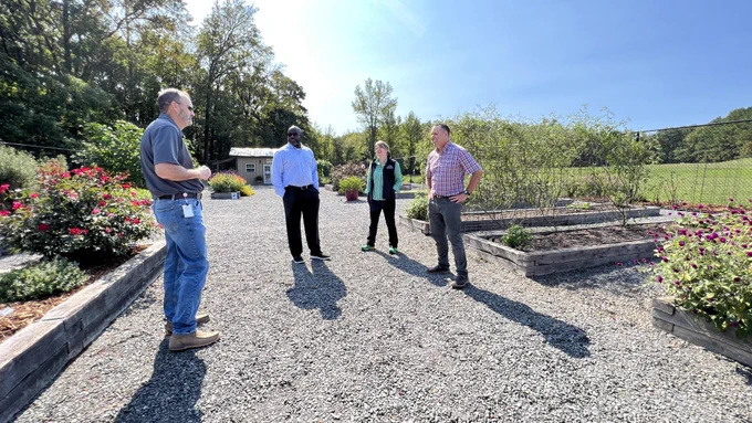 Scott, Fields, Freel, Pitman in the teaching garden at the 4-H Center.