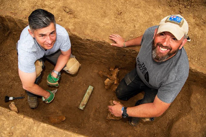 Two of the veterans on the dig at Bullecourt with tank shell case. Photo (c) Harvey Mills Photography