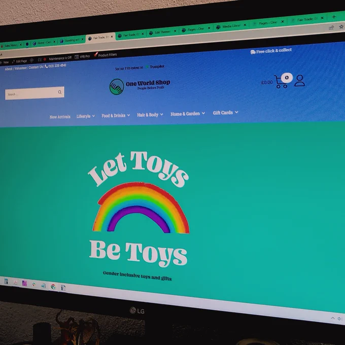 the one world shop website with updated blue and green branding