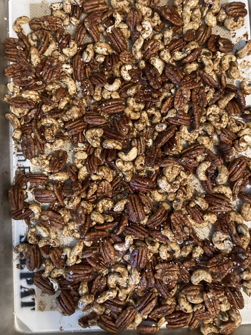 A tray of cashews and pecans lookin’ sweet ‘n’ hot.