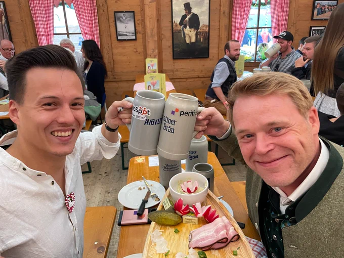 Cheers between Max and Seb