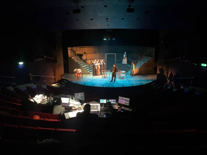 A wide shot of Derby Theatre's main stage, including the tech team and cast of Jekyll and Hyde.