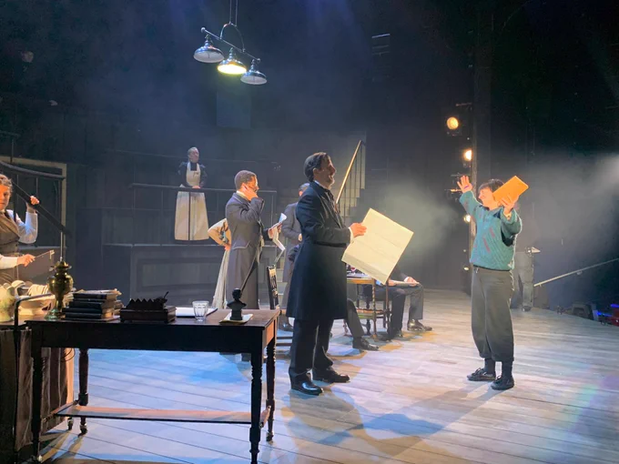 Movement Director Deb Pugh directing Charlie and Levi on Derby Theatre's main stage.