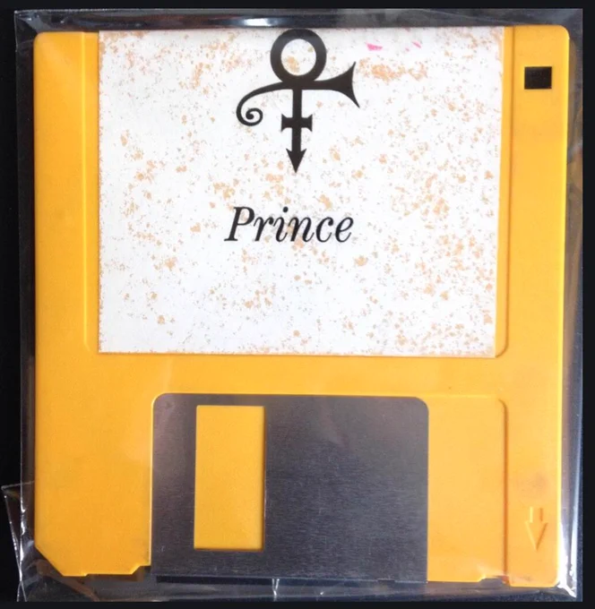 A floppy disk with Prince and a symbol on it