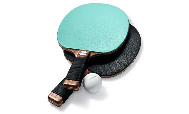 They're just fancy looking ping pong paddles. One side is blue, the other side is black.