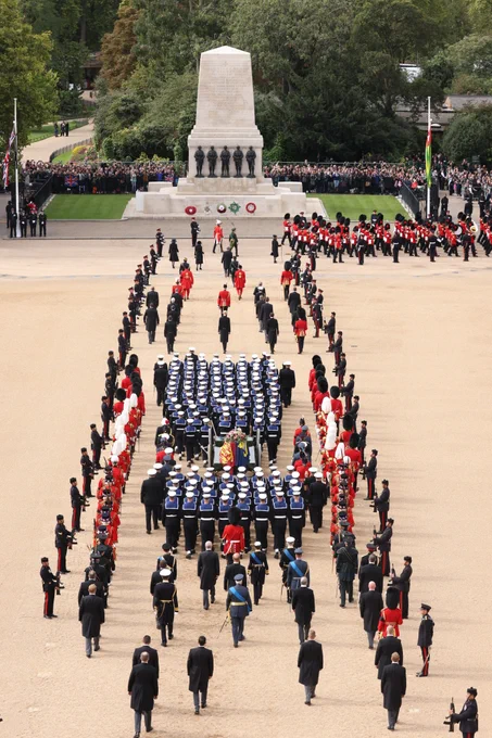 HM Armed Forces lead the procession for Her Majesty The Queen's coffin from Westminster Abbey.