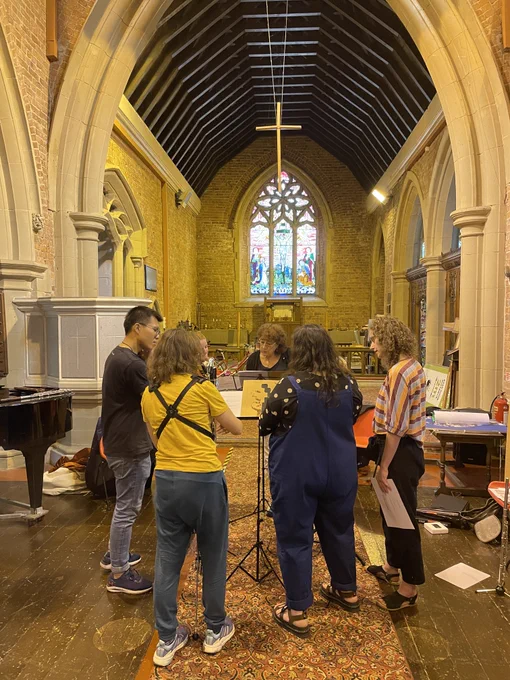 CoMA Manchester rehearsing a brand new work (graphic scores) by Isabel Benito Gutiérrez at St Margaret's Church, Whalley Range. Pictured are members Lorna Green, Ellen Sargen, Isabel Benito Gutiérrez, Jane Flectcher, Bofan Ma, Kelly Jayne Jones.