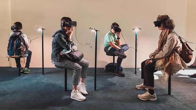 Image of people wearing virtual reality headsets