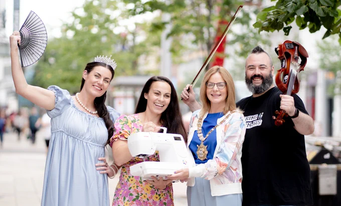 Lord Mayor of Belfast Councillor Christina Black, Rosie McClelland, Angeline Murphy and Mick Conlon from String Ninjas outside 2 Royal Avenue .