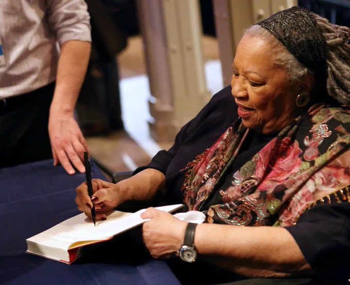 Author Toni Morrison signing books