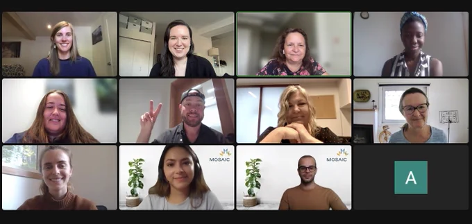 Screenshot of twelve people smiling on a zoom call