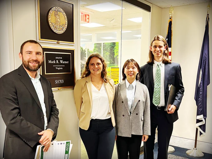 Liz, Yezi, Curtis, and Adam (Senator Warner staff) standing in front of Sen. Warner’s office on the Hill.