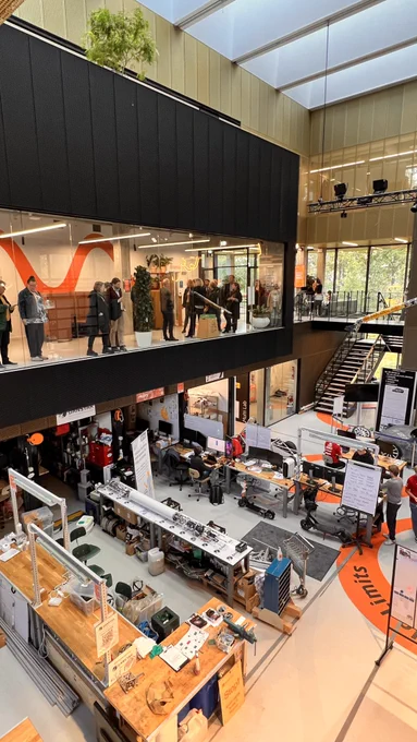 ANE workshop delegates are admiring the Skylab workshop floor from a floor above in the DTU Skylab building.