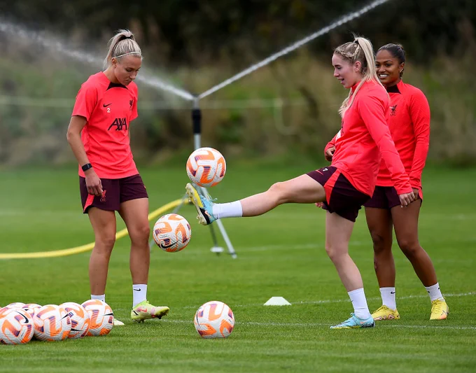 Missy Bo Kearns takes the ball under control with Emma Koivisto to her left and Taylor Hinds behind her and to the right during a training session.
