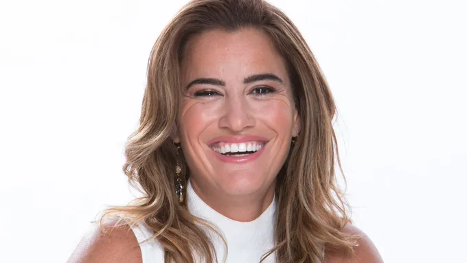 Portrait of Dr Nicole LePera in front of a white background 